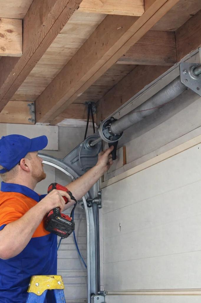 A garage door spring replacement in progress in Drake, CO